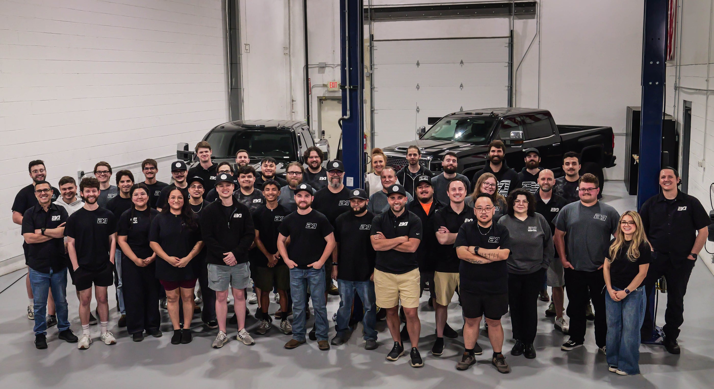 All Boost Auto employees standing for a company photo